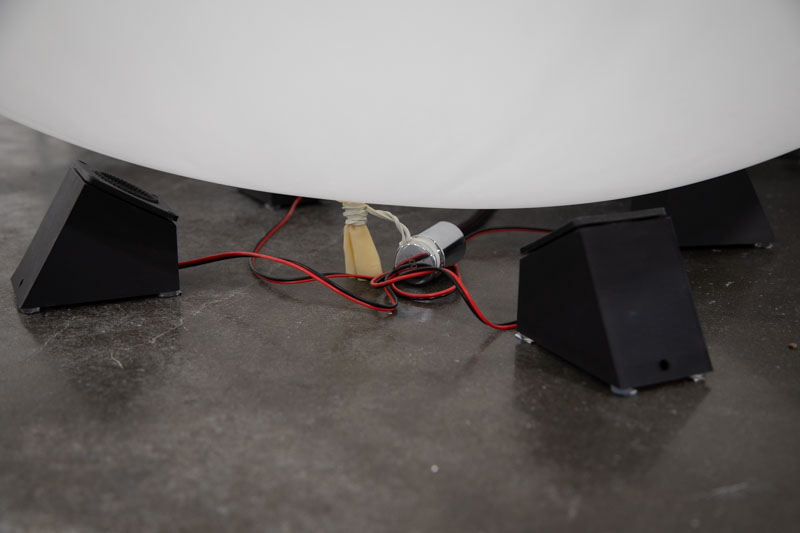 speakers under a balloon
