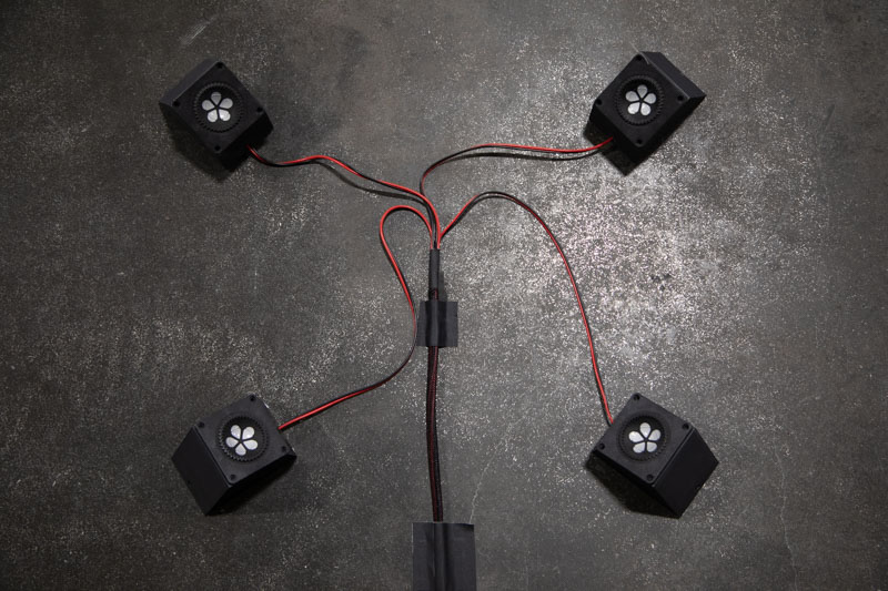 speakers under a balloon
