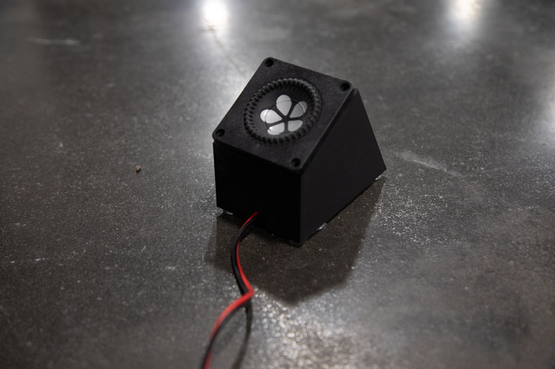 speakers under a balloon